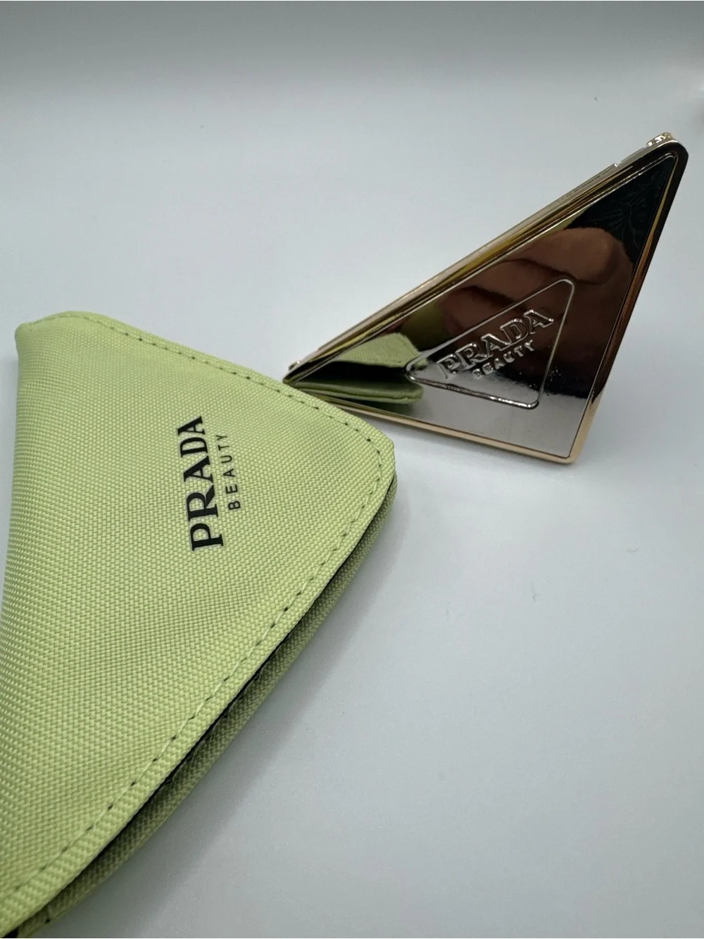 Prada triangle compact